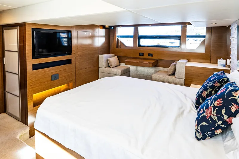 My Way Yacht Photos Pics Luxurious 2019 Cruisers Yachts 54 Cantius bedroom with modern decor and large windows.