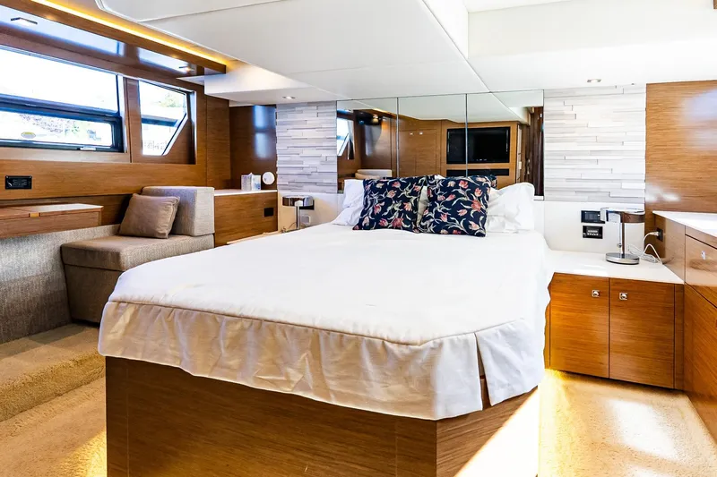 My Way Yacht Photos Pics Luxurious bedroom interior of 2019 Cruisers Yachts 54 Cantius with modern design and cozy ambiance.