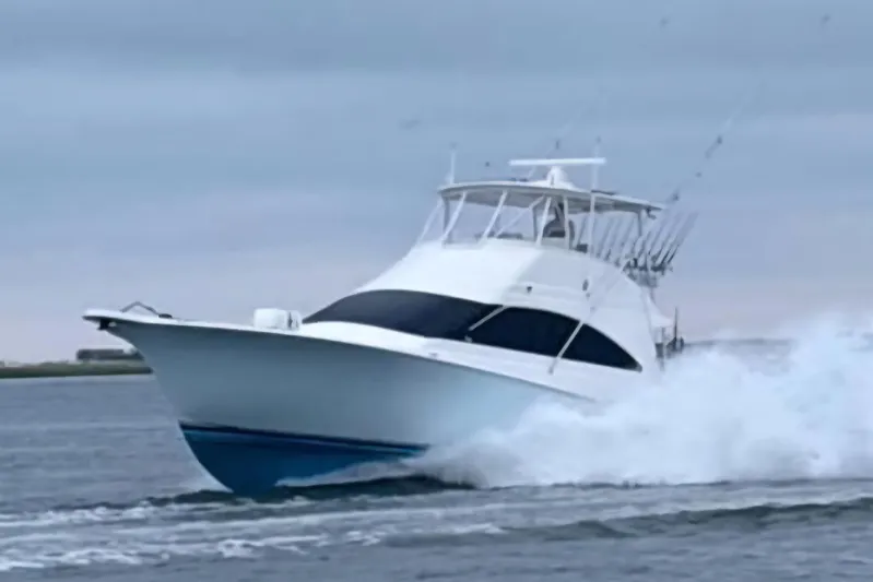  Yacht Photos Pics 2004 Ocean Yachts 50 Super Sport cruising on open water.