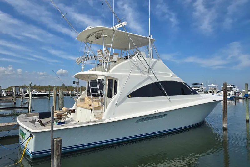  Yacht Photos Pics 2004 Ocean Yachts 50 Super Sport docked at marina under blue sky.