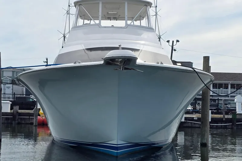  Yacht Photos Pics Front view of a 2004 Ocean Yachts 50 Super Sport docked at a marina.