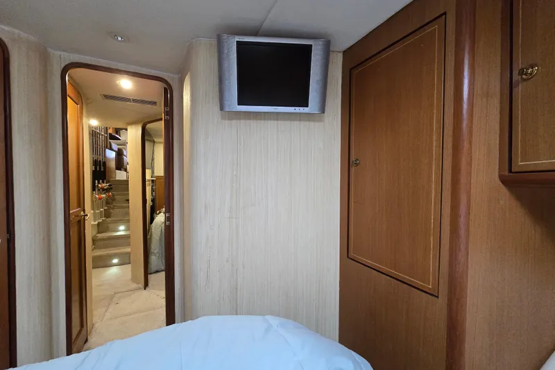  Yacht Photos Pics Interior of 2004 Ocean Yachts 50 Super Sport with TV and wooden cabinetry.