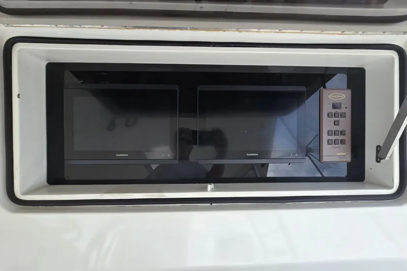  Yacht Photos Pics Control panel of 2004 Ocean Yachts 50 Super Sport with Garmin displays.