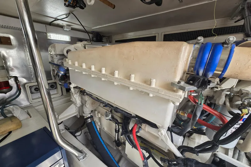  Yacht Photos Pics Engine room of 2004 Ocean Yachts 50 Super Sport, showcasing mechanical components and wiring.