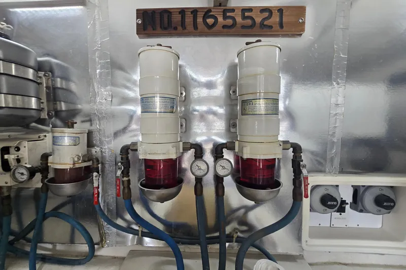  Yacht Photos Pics Engine room of 2004 Ocean Yachts 50 Super Sport with fuel filters and gauges.