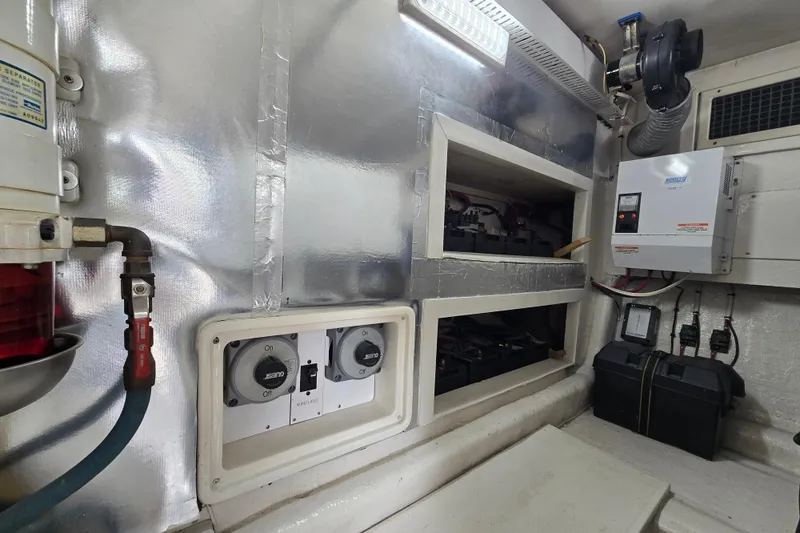  Yacht Photos Pics Engine room of 2004 Ocean Yachts 50 Super Sport, showcasing electrical systems and components.