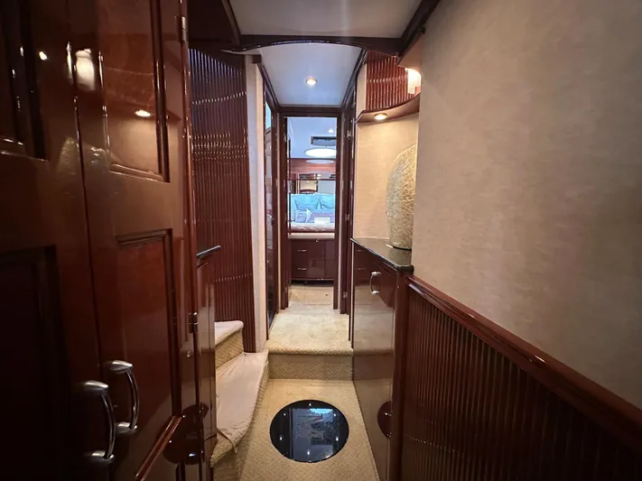 Big Daddy Yacht Photos Pics Luxurious interior of 2007 Marquis 59 Markham Edition yacht with elegant wood paneling.