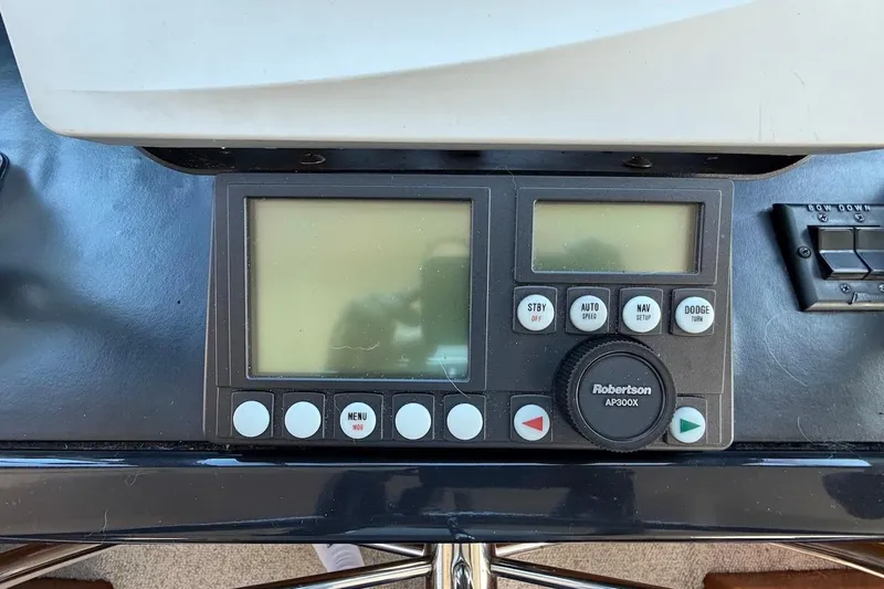 Maritere Yacht Photos Pics Control panel of a 1999 Viking 58 Convertible boat with Robertson AP300X autopilot.