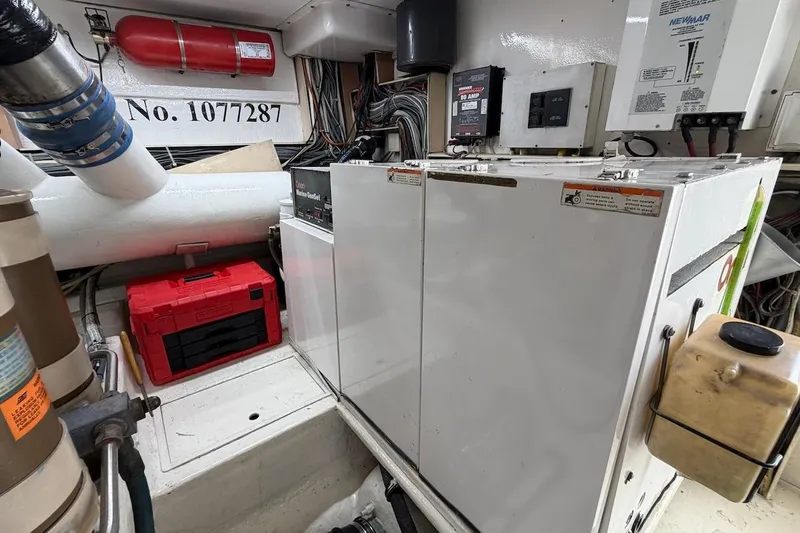 Maritere Yacht Photos Pics Engine room of 1999 Viking 58 Convertible with equipment and wiring.