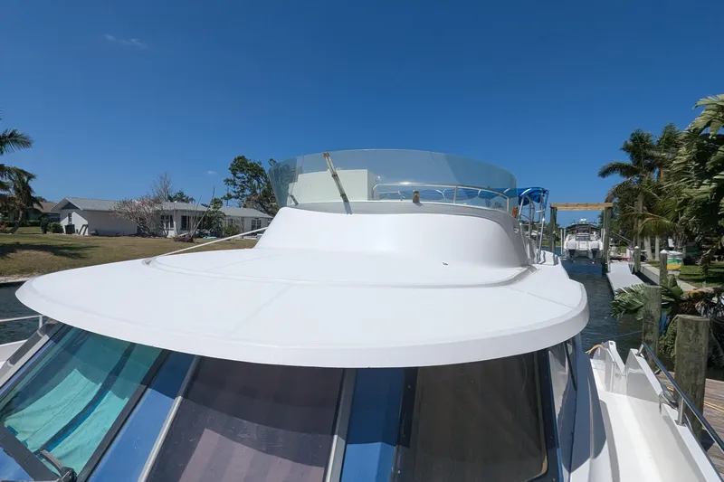 Sometimes Nancy Yacht Photos Pics 2003 Fountaine Pajot Maryland 37 yacht docked under clear blue sky.