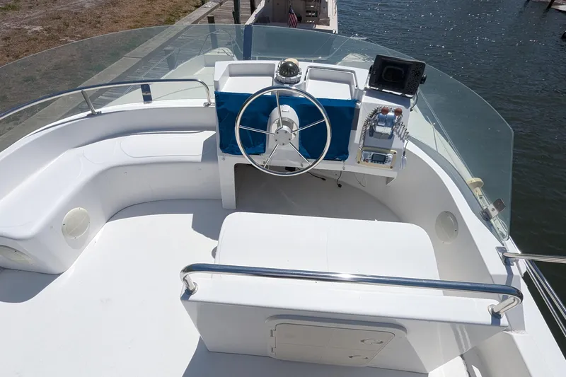 Sometimes Nancy Yacht Photos Pics Flybridge of 2003 Fountaine Pajot Maryland 37 yacht with steering wheel and controls.