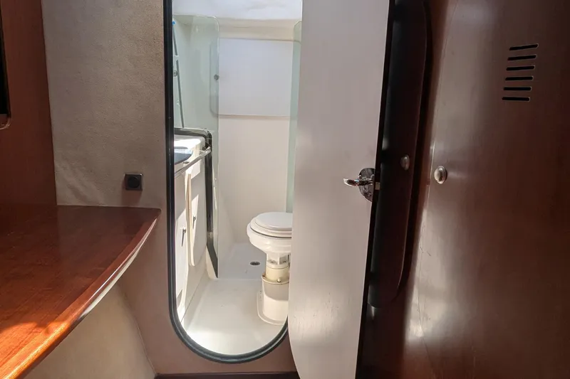 Sometimes Nancy Yacht Photos Pics Interior view of 2003 Fountaine Pajot Maryland 37 yacht bathroom with wooden accents.