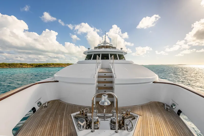 Calliope Yacht Photos Pics Luxurious 2007 Richmond Yachts Semi Displacement on serene ocean waters under a blue sky.