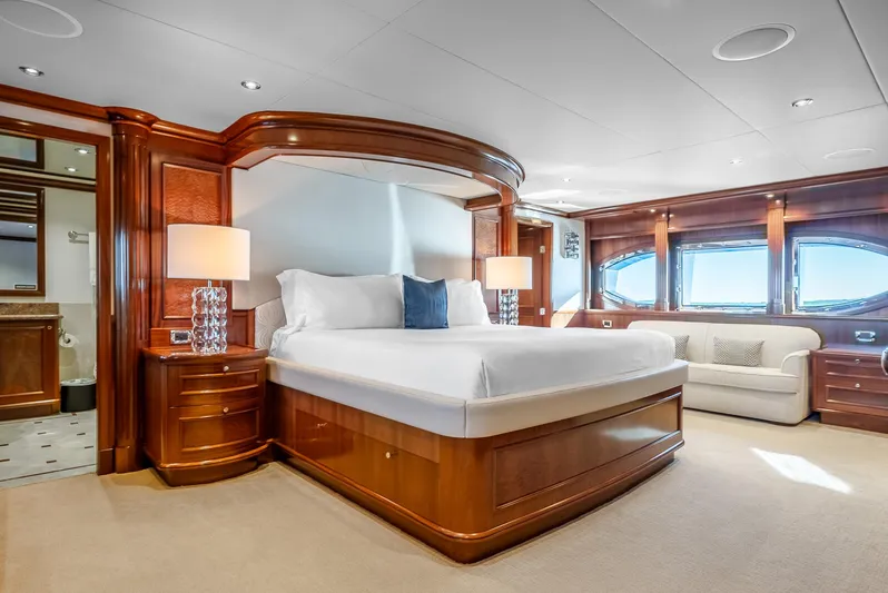 Calliope Yacht Photos Pics Luxurious Richmond Yachts 2007 bedroom with elegant wood finishes and large windows.