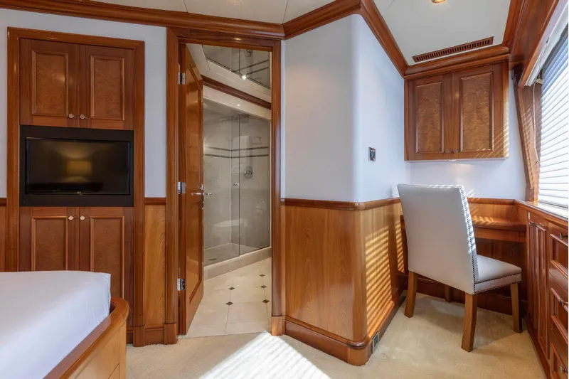Calliope Yacht Photos Pics Luxurious Richmond Yachts 2007 interior with wood paneling, desk, and ensuite bathroom.