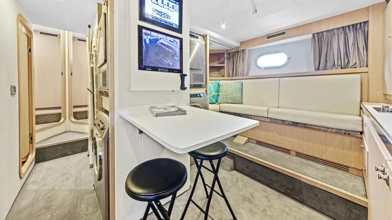 Chitochi Yacht Photos Pics Luxurious 2016 Custom Line Ferretti yacht interior with modern seating and entertainment area.