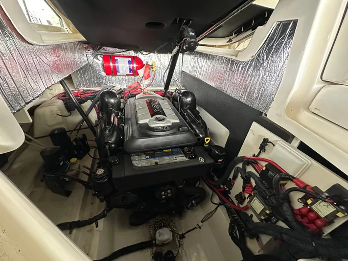  Yacht Photos Pics Engine compartment of a 2017 Sea Ray SLX 280 boat, featuring a well-organized layout.
