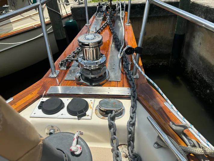 Island Girl Yacht Photos Pics Deck of 1990 Island Packet 38 sailboat with anchor chain and winch.