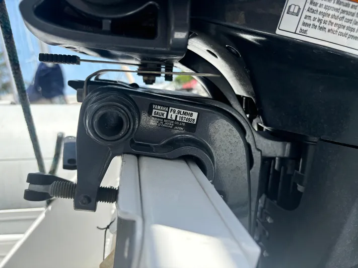 Island Girl Yacht Photos Pics Close-up of Yamaha F9.9LMHB motor on 1990 Island Packet 38 sailboat.