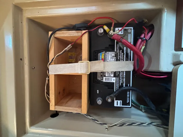 Island Girl Yacht Photos Pics Battery compartment of a 1990 Island Packet 38 sailboat with secured wiring.