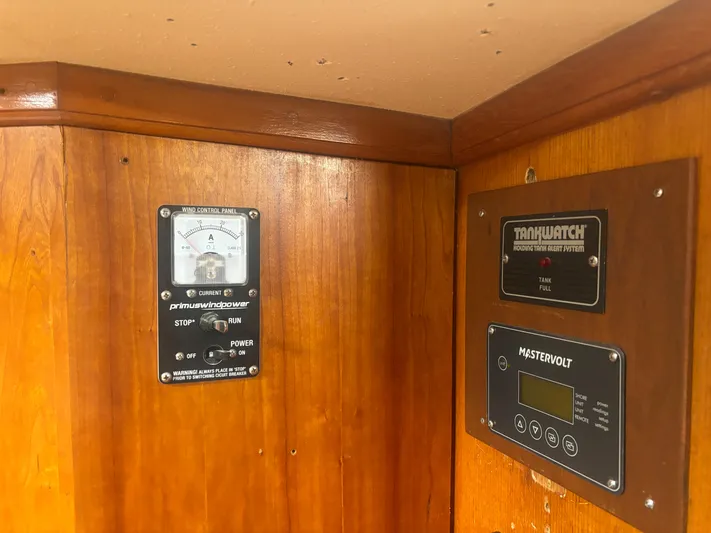 Island Girl Yacht Photos Pics Control panel on 1990 Island Packet 38 sailboat with gauges and meters.