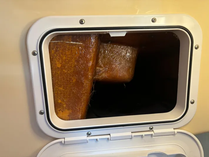 Island Girl Yacht Photos Pics Hatch opening on a 1990 Island Packet 38 sailboat, showing interior compartment.