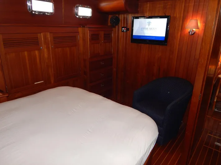 The Harlen Wood Yacht Photos Pics Luxurious cabin interior of 2010 Shannon 53 HPS yacht with wood paneling and cozy seating.