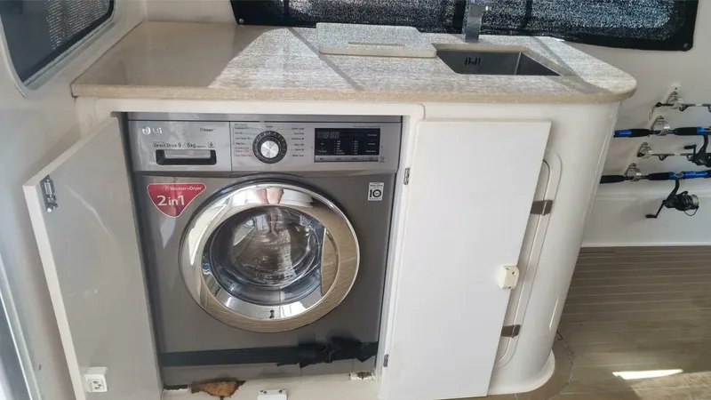 Albatross Yacht Photos Pics 2014 PowerPlay Catamarans Power Cat with built-in LG washer and sink.