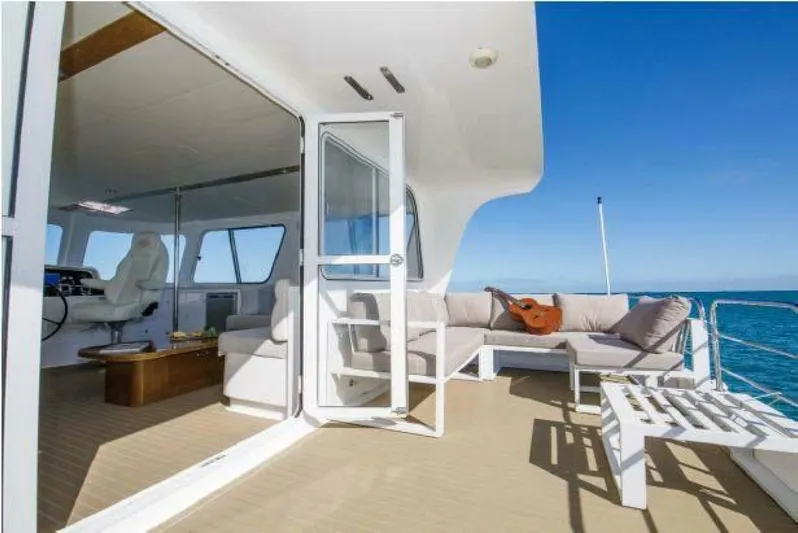 Albatross Yacht Photos Pics Luxurious 2014 PowerPlay Catamarans Power Cat with spacious deck and ocean view.