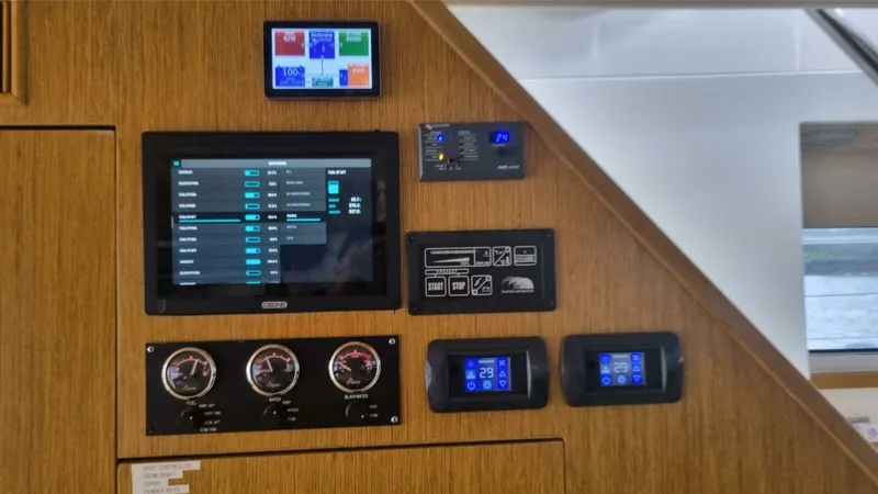 Albatross Yacht Photos Pics Control panel of 2014 PowerPlay Catamarans Power Cat with digital displays and gauges.
