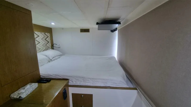 Albatross Yacht Photos Pics Cozy bedroom in 2014 PowerPlay Catamarans Power Cat with modern decor.