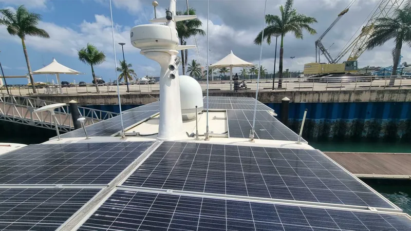 Albatross Yacht Photos Pics 2014 PowerPlay Catamarans Power Cat with solar panels docked at marina.