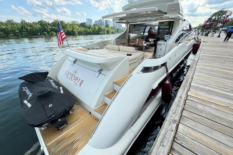Victoria Yacht Photos Pics Luxury 2007 Azimut 68S yacht docked, featuring elegant design and spacious deck.