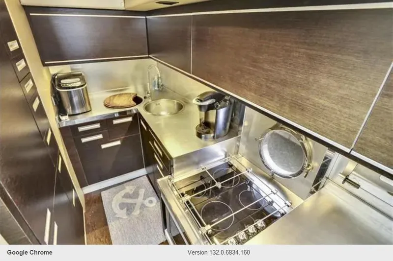 Victoria Yacht Photos Pics Luxurious kitchen interior of 2007 Azimut 68S yacht with modern appliances.