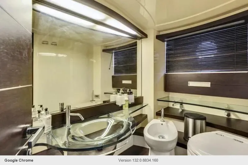 Victoria Yacht Photos Pics Luxurious bathroom interior of 2007 Azimut 68S yacht with modern fixtures and sleek design.