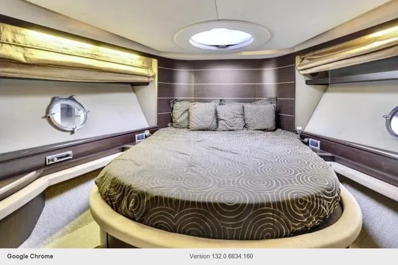 Victoria Yacht Photos Pics Luxurious bedroom interior of 2007 Azimut 68S yacht with circular bed and modern design.