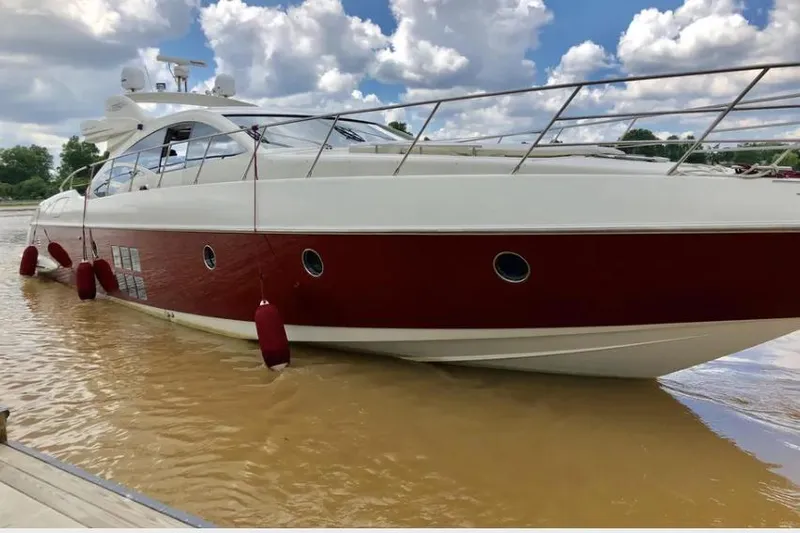 Victoria Yacht Photos Pics 2007 Azimut 68S yacht with red and white exterior on a sunny day.
