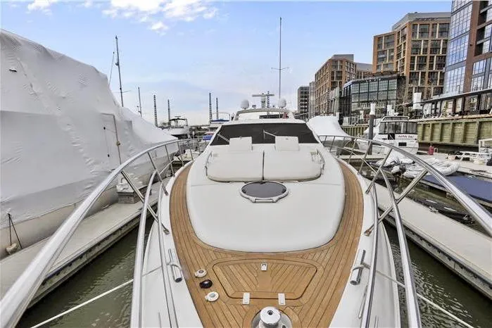 Victoria Yacht Photos Pics 2007 Azimut 68S yacht docked in a marina, showcasing sleek design and luxury features.