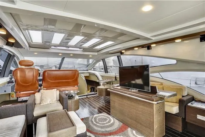 Victoria Yacht Photos Pics Luxurious interior of 2007 Azimut 68S yacht with modern seating and entertainment area.