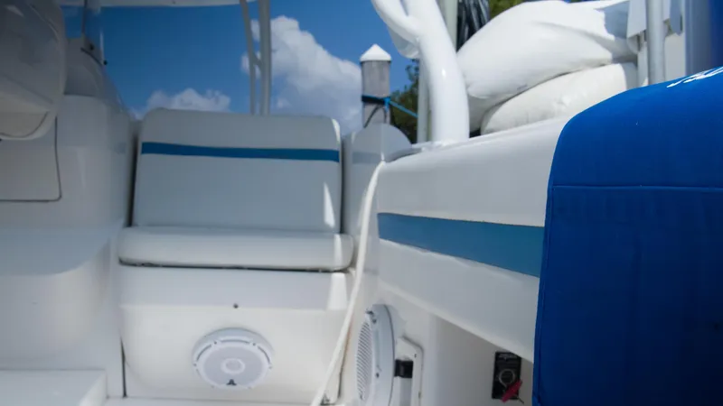 R&r Yacht Photos Pics Interior of 2017 Intrepid 400 Cuddy boat with white and blue seating.
