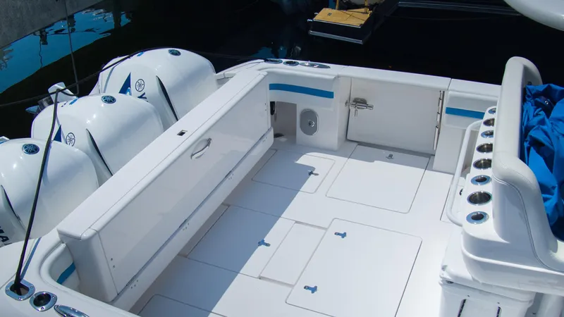 R&r Yacht Photos Pics 2017 Intrepid 400 Cuddy boat deck with triple outboard engines.
