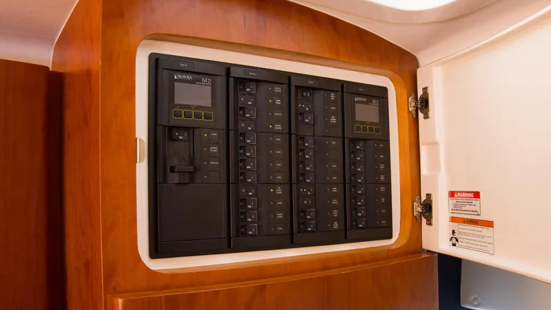 R&r Yacht Photos Pics Electrical panel inside a 2017 Intrepid 400 Cuddy boat.