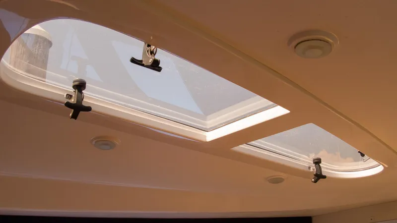R&r Yacht Photos Pics 2017 Intrepid 400 Cuddy cabin skylight with latches and interior lighting.