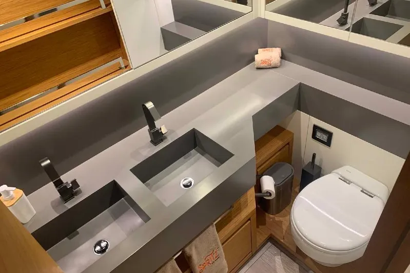 Pardo Endurance 60 Yacht Photos Pics Luxurious bathroom in 2023 Pardo Yachts E60, featuring dual sinks and modern fixtures.