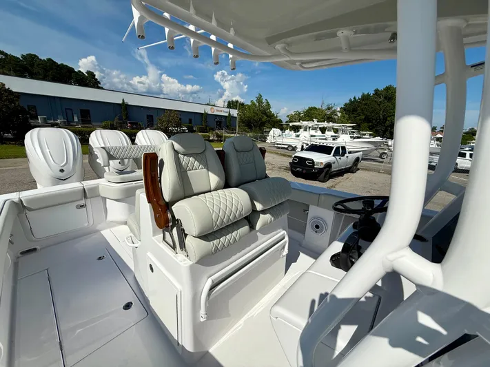  Yacht Photos Pics Luxurious interior of 2026 Jupiter 34 boat with plush seating and modern controls.