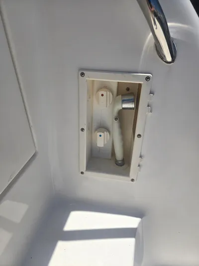 Michael B Yacht Photos Pics 1998 Sea Ray 500 Sundancer boat detail showing a built-in shower fixture.