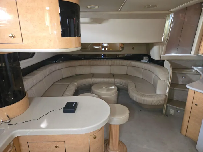 Michael B Yacht Photos Pics Interior of 1998 Sea Ray 500 Sundancer yacht with curved seating and modern amenities.