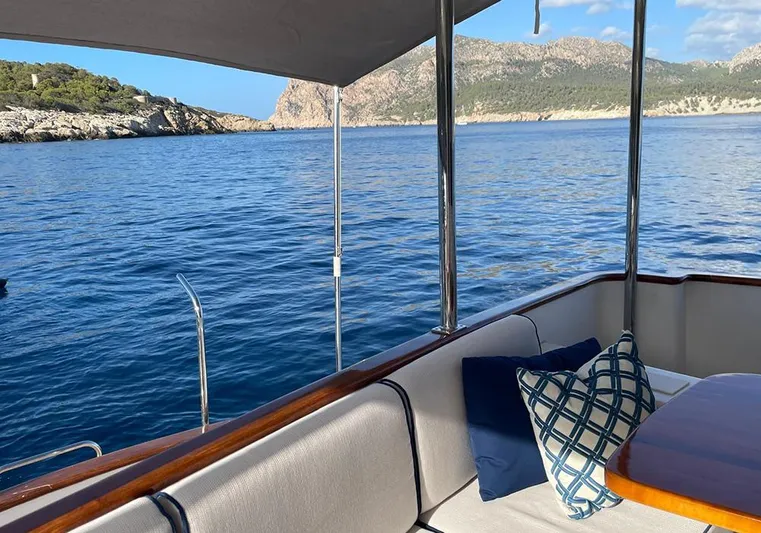 Bochinche Yacht Photos Pics Grand Alaskan 65 Flush Deck yacht, 2006, with scenic ocean view and comfortable seating.