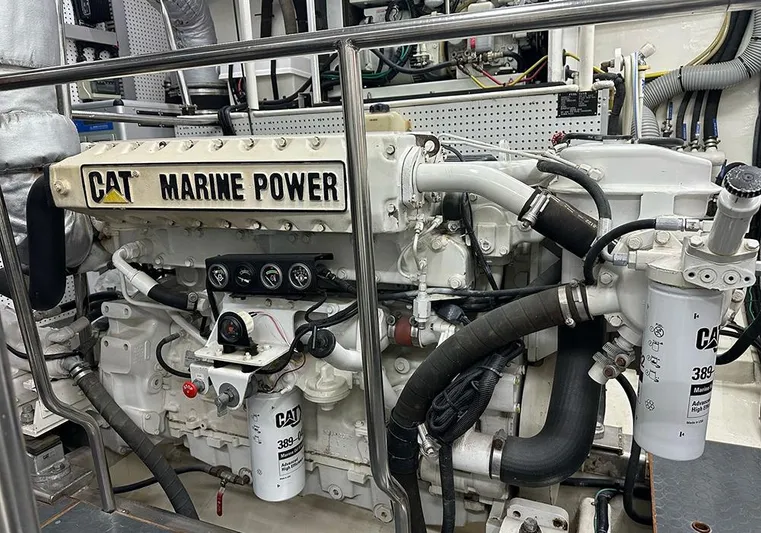 Bochinche Yacht Photos Pics Engine room of 2006 Grand Alaskan 65 Flush Deck with CAT Marine Power engine.