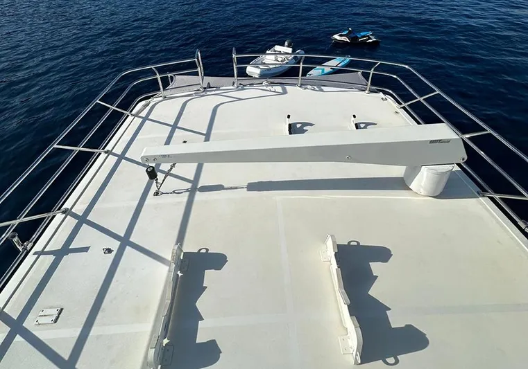 Bochinche Yacht Photos Pics 2006 Grand Alaskan 65 Flush Deck yacht with spacious deck and ocean view.